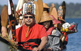 The Tlingit tribe wait to come ashore during the Ceremonial Landing and the commencement of Tribal Journeys.