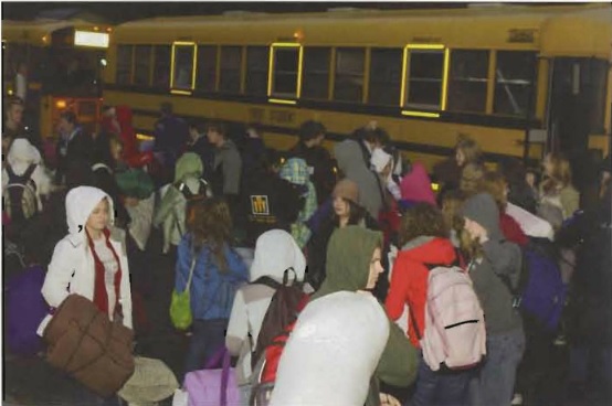 Explore! students gathering by school buses