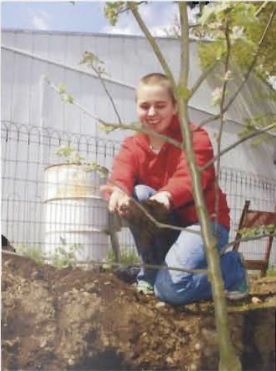 Student working in the PLU Community Garden