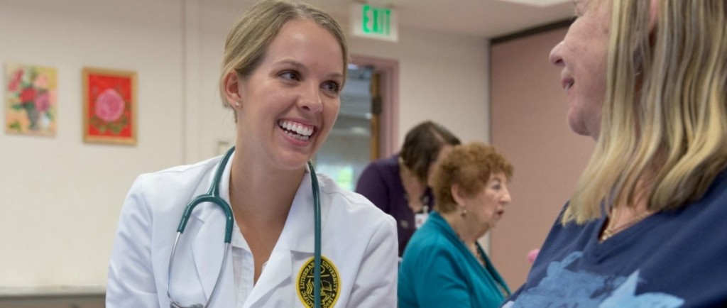 Doctor of Nursing Practice student talking to a patient