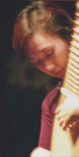 PLU showcases Chinese opera, music, and martial arts. Traditional Chinese pipa, a four-stringed lute.