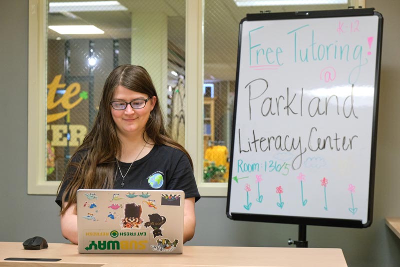 Kaila Harris '23, education major who started out as a music ed. major, photographed in the Parkland Literacy Center room of the AUC, Thursday, March 10, 2022, at PLU. (PLU Photo/John Froschauer)