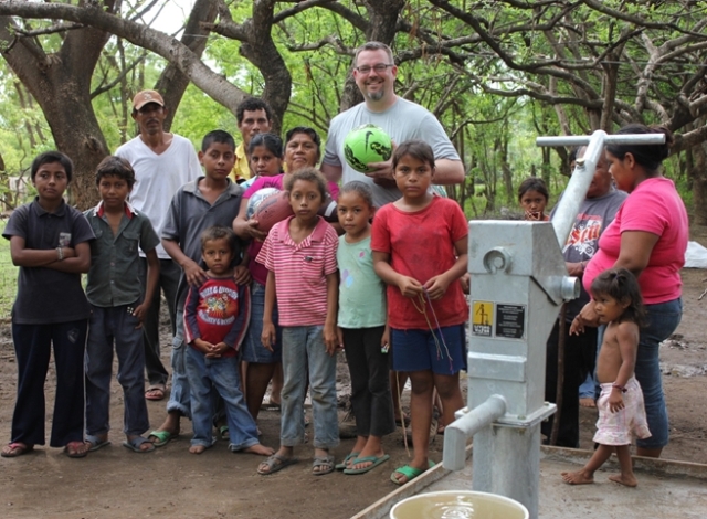 Mark Mulder with villagers