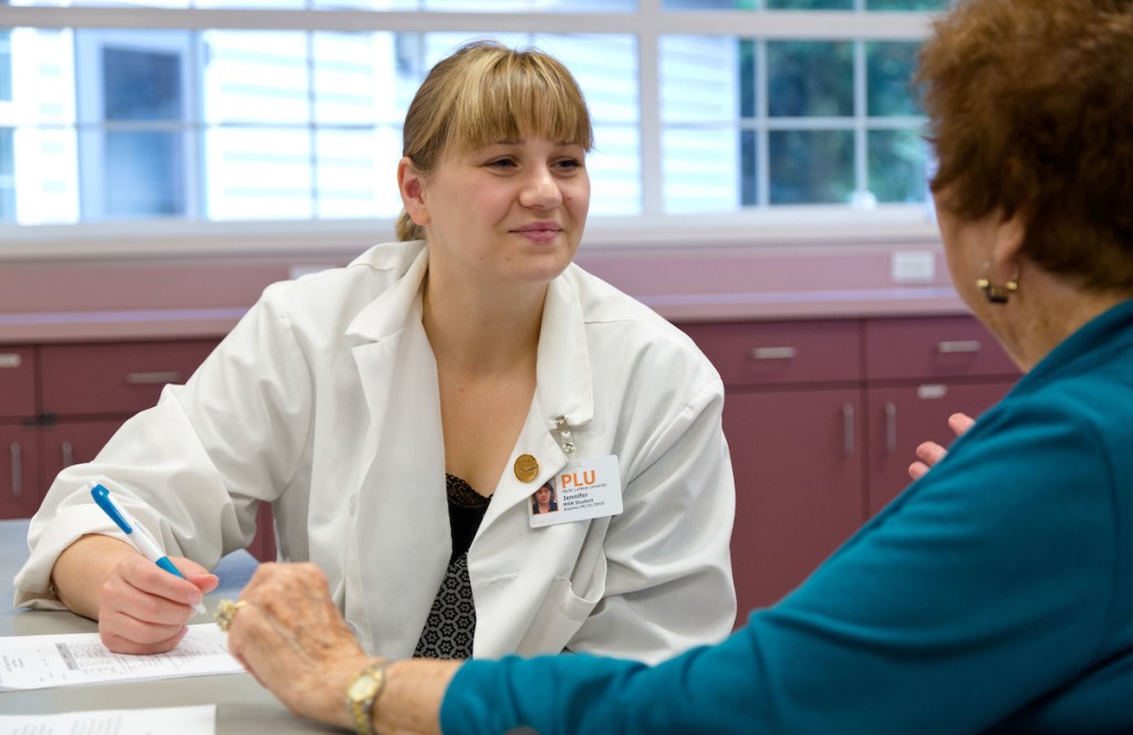 PLU Nurse Practitioner students working in a clinic at the Sumner Senior Center on Thursday, Sept. 25, 2014. (Photo/John Froschauer)