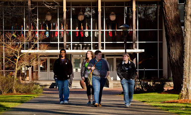 students leaving Hauge Admin building