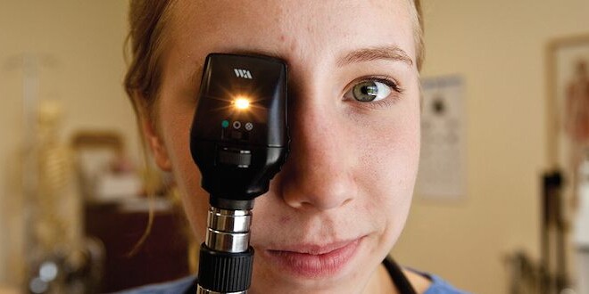 CCNL Banner - Rasmunson, nursing student looking through direct ophthalmoscope