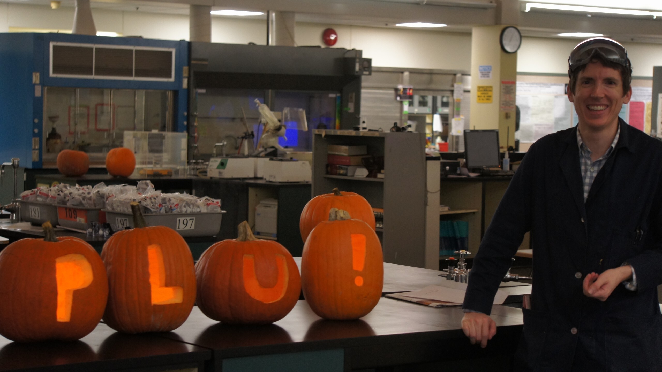 Professor Jon Freeman and carved PLU pumpkins