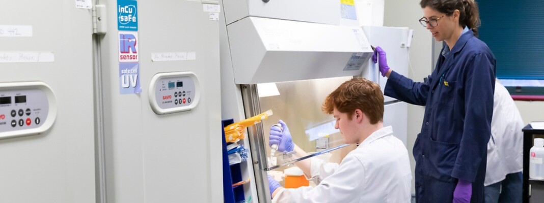 Ryan Fisher working in the lab with Professor Boysen.