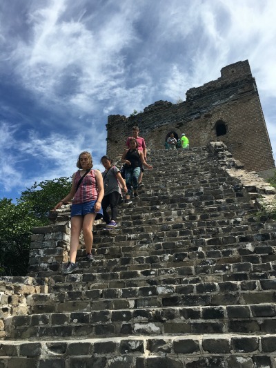 students-walking-down-some-ancient-stairs