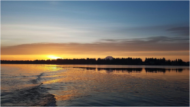 Photo courtesy of Kam Coon – Sunrise on American Lake (within Clover Creek Watershed)