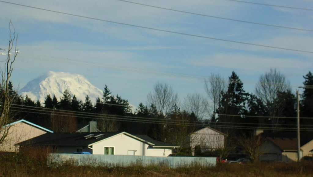 Mount Rainier with Parkland homes in foreground