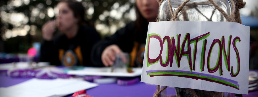 Donations bottle for Colleges against Cancer