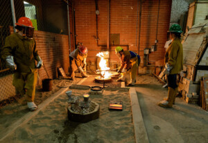 Pouring a bronze sculpture in the foundry