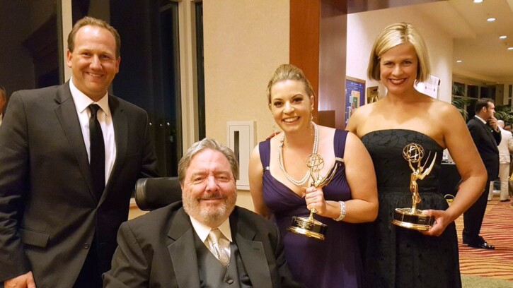 PLU Alumni Chris Egan, Ray Heacox, Carla Miller and Alison Grande. Photo by Joanne Lisosky. Holding two emmys.