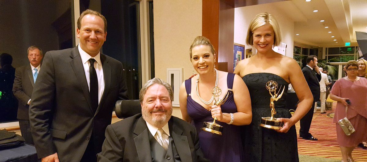 PLU Alumni Chris Egan, Ray Heacox, Carla Miller and Alison Grande. Photo by Joanne Lisosky. Holding two emmys.