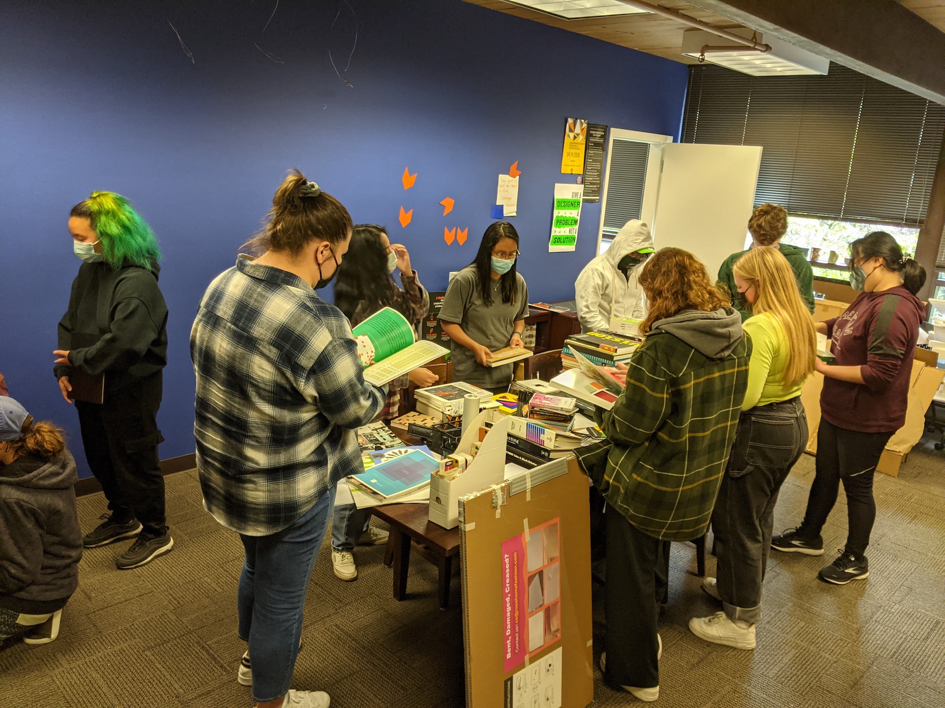 Students prepare to arrange and organize materials