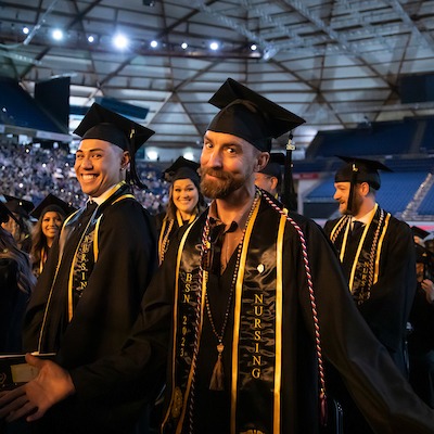 The class of 2023 graduates, Saturday, May 27, 2023, at the Tacoma Dome in Tacoma. (PLU Photo / Sy Bean)