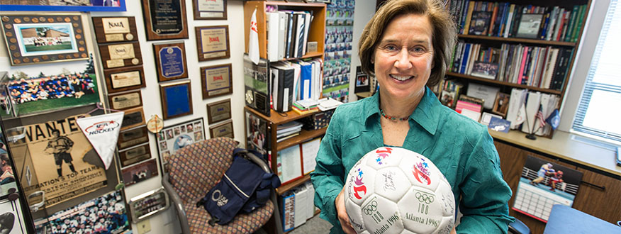 Dr. Colleen Hacker in her office at PLU.