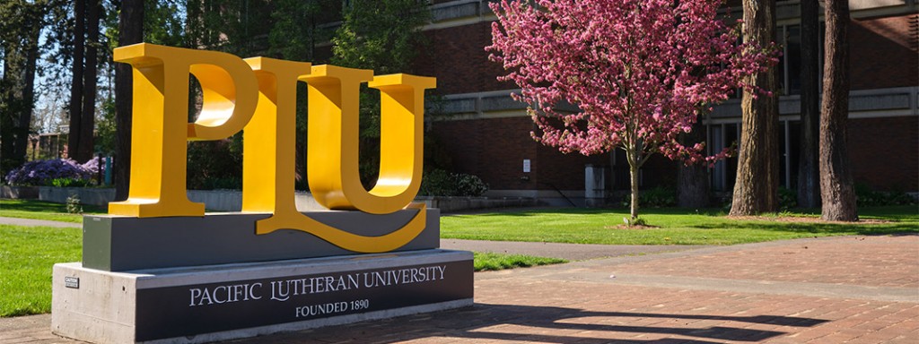 PLU sign in front of campus form Garfield Street.