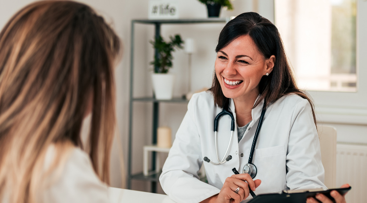 Doctor meeting with a patient.