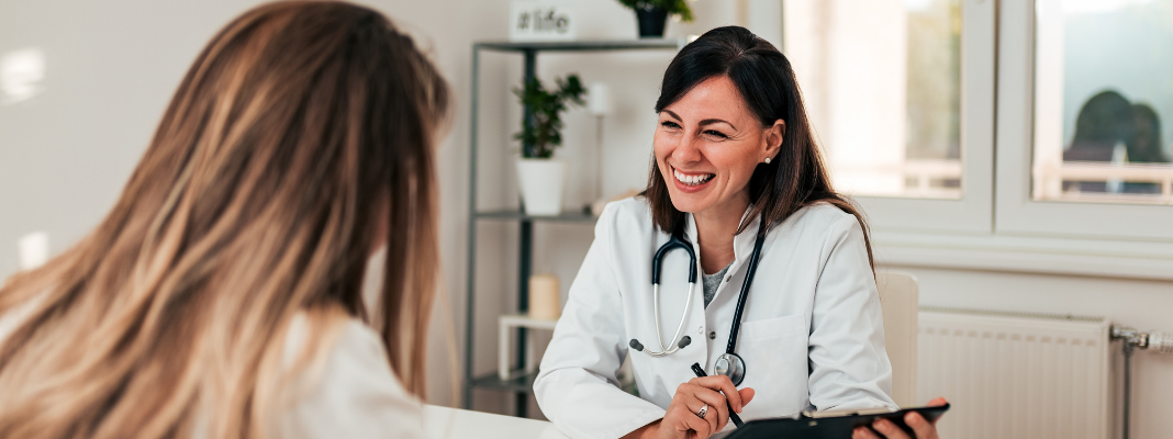 Doctor meeting with a patient.