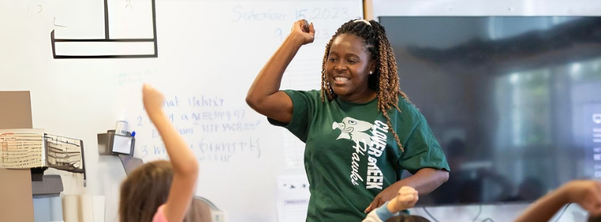 Brianna Wells with the help of Eva Dumeni lead reading lessons, Friday, Sept. 15, 2023, at Clover Creek Elementary School. Dumeni is helping in the classroom as part of the Ukumwe Project, where PLU Education Alumni collaborate with Namibian partners. (PLU Photo / Sy Bean)