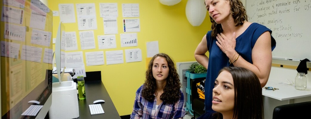 Shannon Seidel, assistant professor of biology, works with Courtney Hartman ’18, a biology major, and Miranda Martens ’18, a sociology major, on a research project looking at science education in a lab in Rieke at PLU, Tuesday, July 11, 2017. (Photo: John Froschauer/PLU)