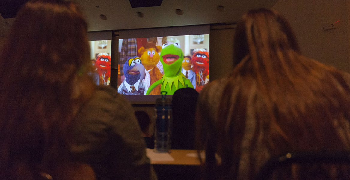 students watching the muppets