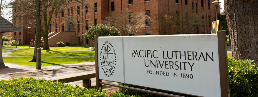 PLU sign in front of Harstad Hall