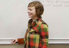 student at white board