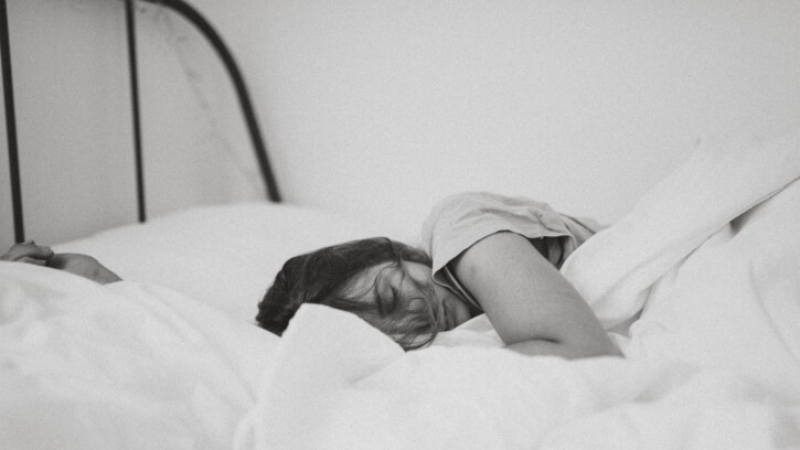 Sleeping person in bed
