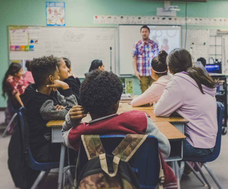 Classroom with students and a teacher