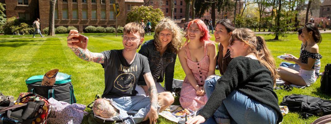 French professor Rebecca Wilkin leads her French 406 outside for a French picnic, Thursday, April 27, 2023, at PLU. (PLU Photo / Sy Bean)