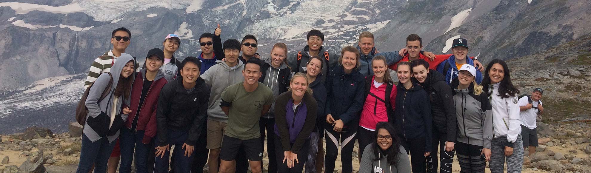 PLU International students posing for a group photo while on a hike up Mt. Rainier in Washington State
