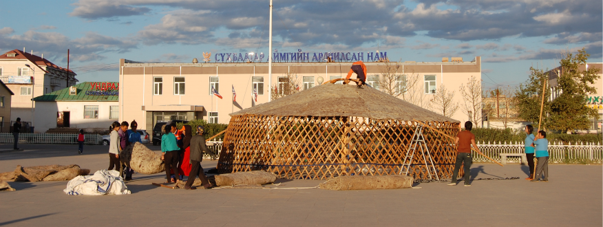 wooden structure being built in a town