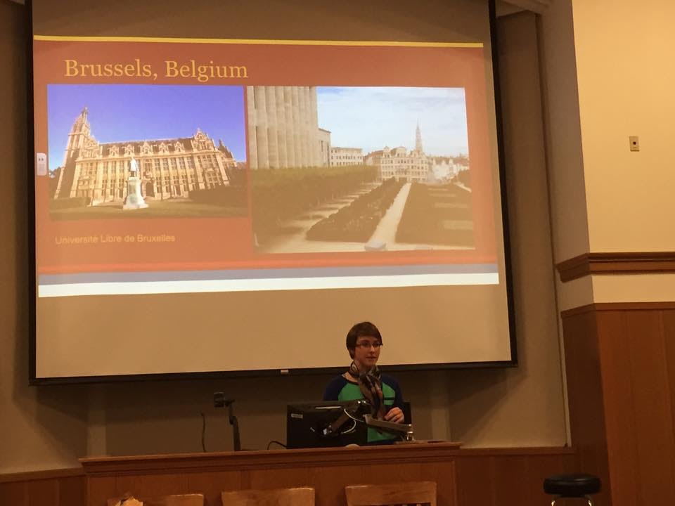 Belgium lecture - student standing at lecture podium