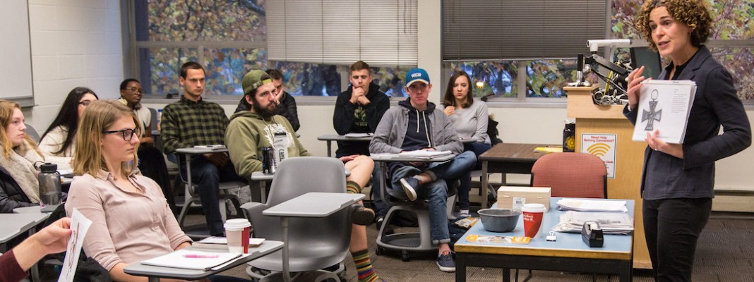 Students study reproductions of artifacts from the Holocaust Center for Humanity brought by Ilana Conne Kennedy to a history class taught by Prof. Lisa Marcus at PLU, Wednesday, Nov. 8, 2017. (Photo: John Froschauer/PLU)