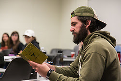 Students study reproductions of artifacts from the Holocaust Center for Humanity