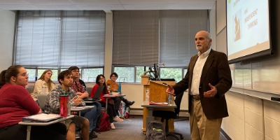 Image: Holocaust survivor Peter Metzelaar speaks with PLU students in a course titled “Introduction to Holocaust & Genocide Studies.” (Photo courtesy of Professor Lisa Marcus)