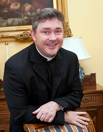Father Charles R. Gallagher, S.J.