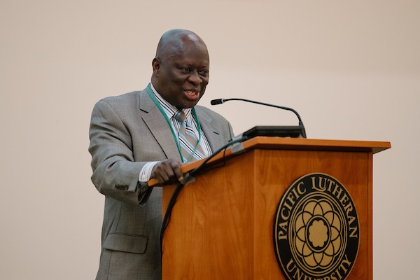 Dr. Edward Kissi, Associate Professor in the Department of Africana Studies at the University of South Florida, delivers his keynote address titled “Sub-Saharan Africans and the Holocaust” during the 15th Annual Powell-Heller Conference for Holocaust Education, Wednesday, Oct. 25, 2023, at PLU. (PLU Photo / Emma Stafki).
