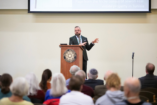 Dr. Terrence Peterson, Assistant Professor at Florida International University and a faculty affiliate in the Holocaust and Genocide Studies Program at FIU, delivers his speech titled “Vichy and the Jews of Tunisia at the Crossroads of Colonialism and the Shoah,” during the 15th Annual Powell-Heller Conference for Holocaust Education, Thursday, Oct. 26, 2023, in the AUC at PLU. (PLU Photo / Sy Bean)
