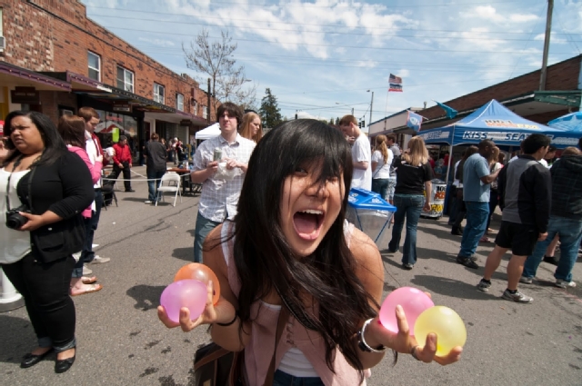 Garfield Street Fair - student holding water balloons