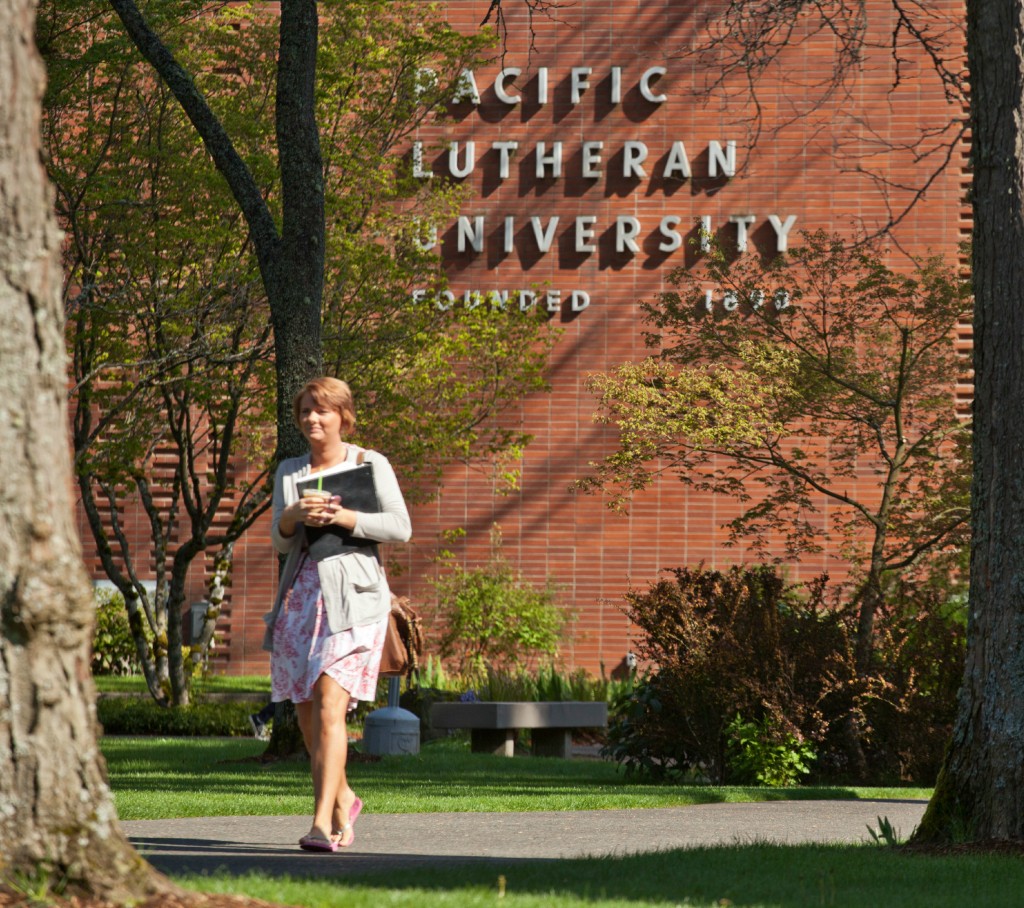 Student walking out of Hauge Administration building