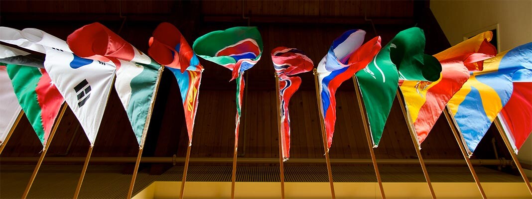 A wall of flags from various countries of the world