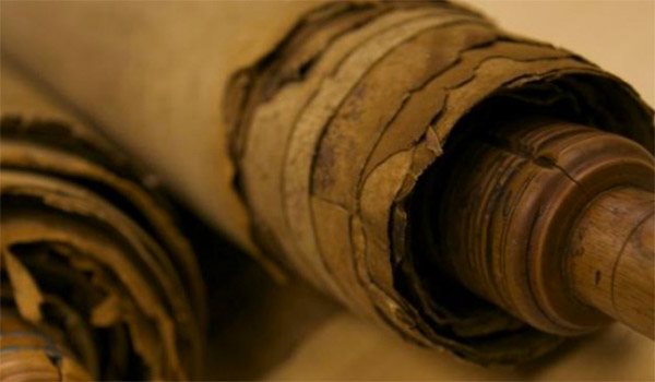 Two rolled up scribes of paper