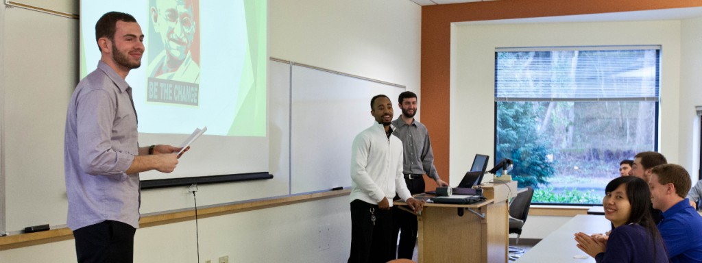 Students making a presentation in front of the classroom