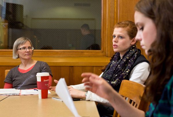 "Economics professor Lynn Hunnicutt discusses vocation with PLU students."