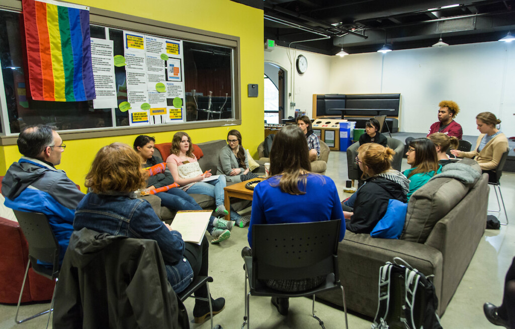 Amanda McCarty '04, speaks with a group of students, faculty and staff in The Cave at PLU, Tuesday, April 18, 2017. McCarty is the Earth Day speaker on the topic of Climate Change, she is an environmental scientist and policy maker with the National Oceanic and Atmospheric Administration (NOAA)(Photo: John Froschauer/PLU)