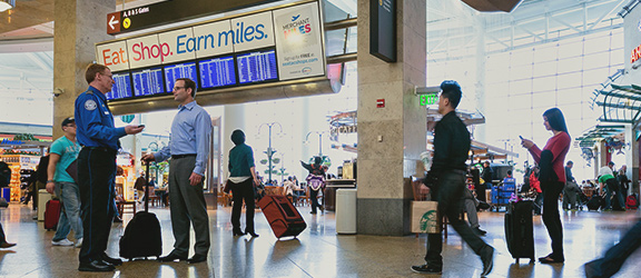 iss-email-banner students in airport